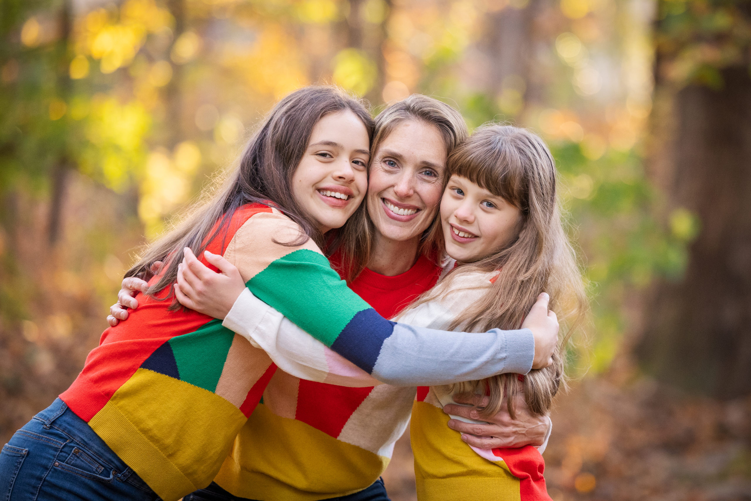 mom and daughters fall portrait