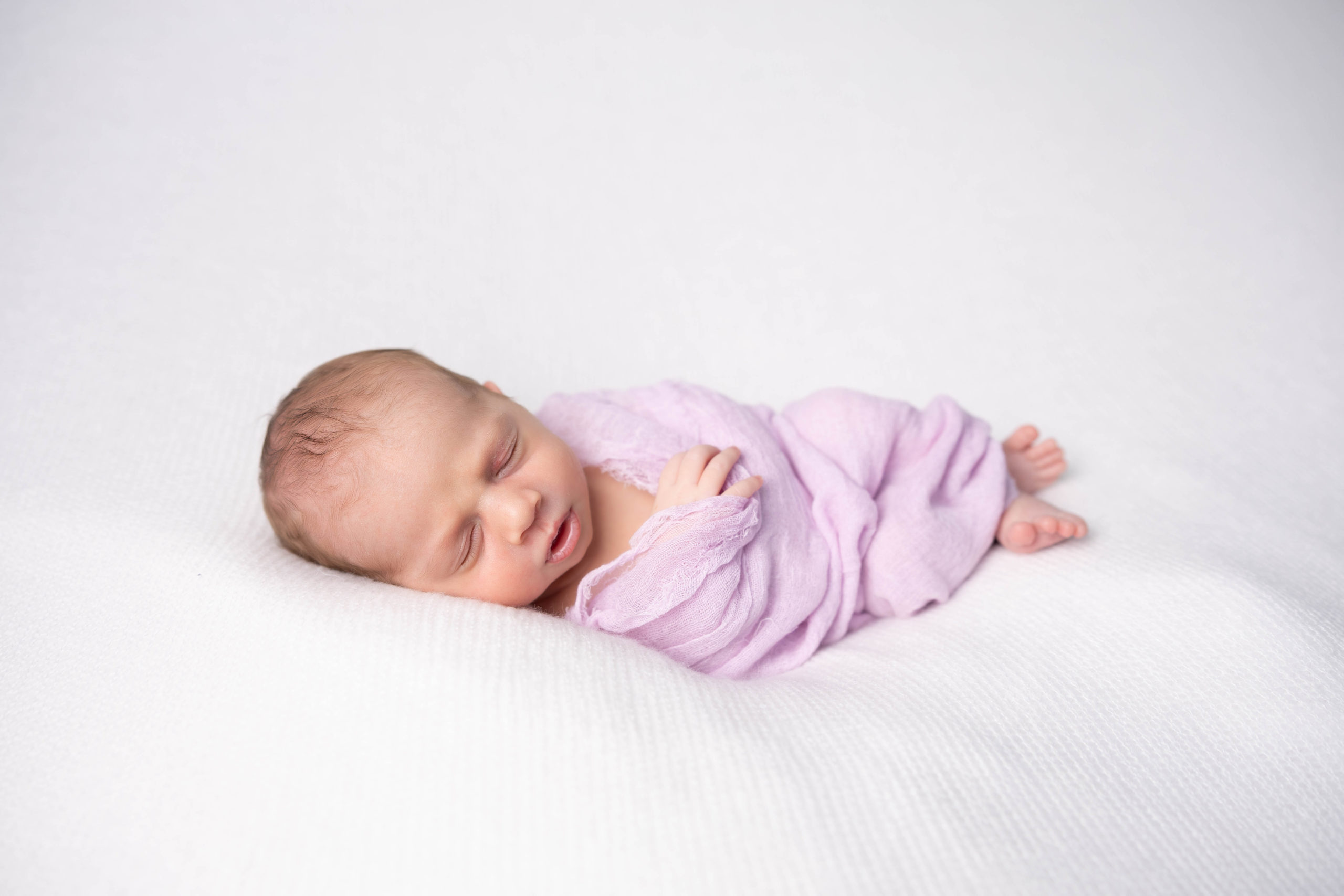 NOVA newborn photographer captures a 28 day old baby girl.