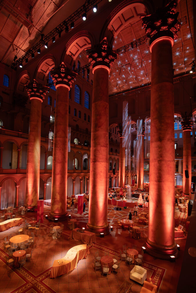 Large corporate celebration inside the National Building Museum photographed by a Washington DC event photographer
