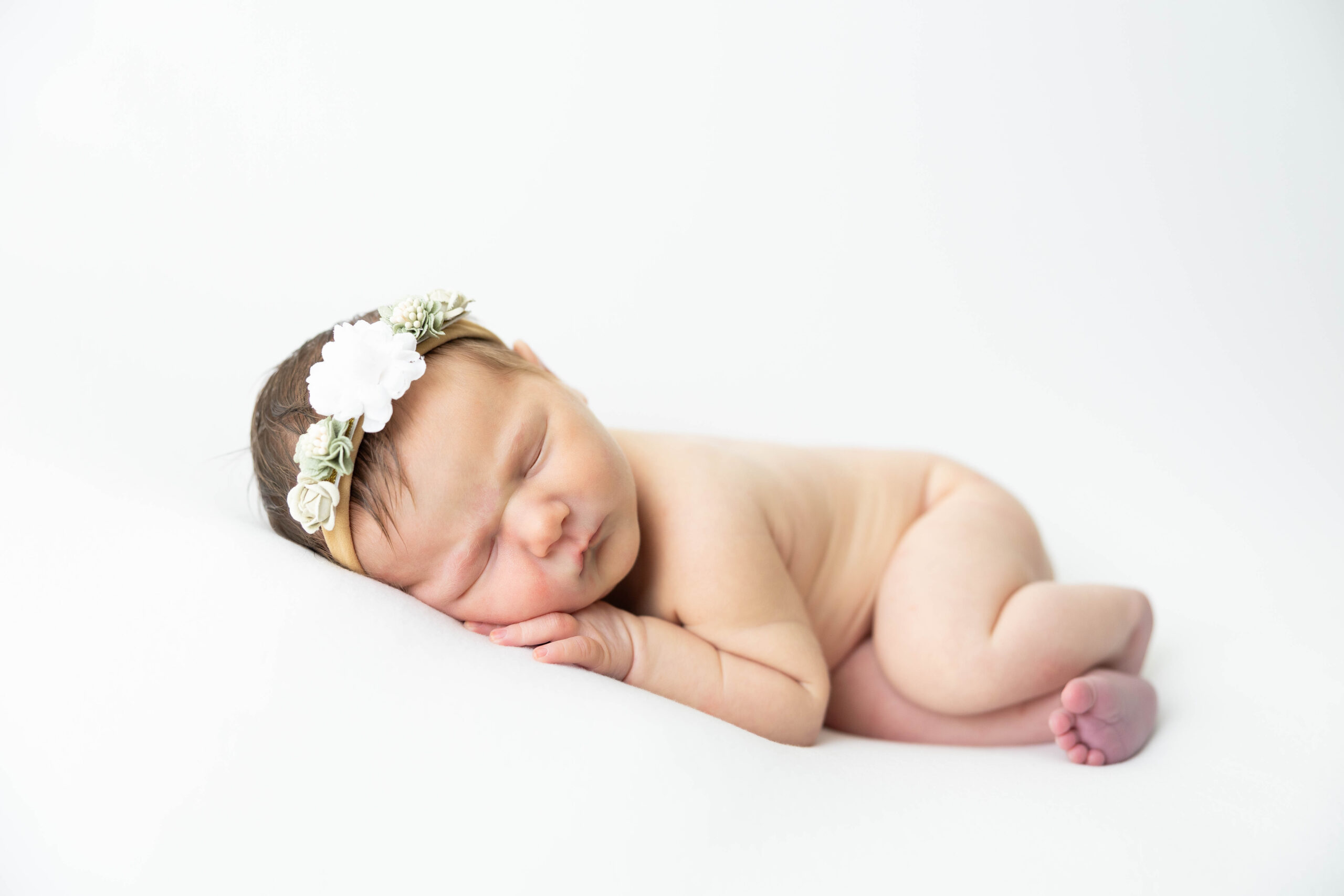 Newborn baby Taylor during an in-home lifestyle newborn photography session in Northern Virginia.