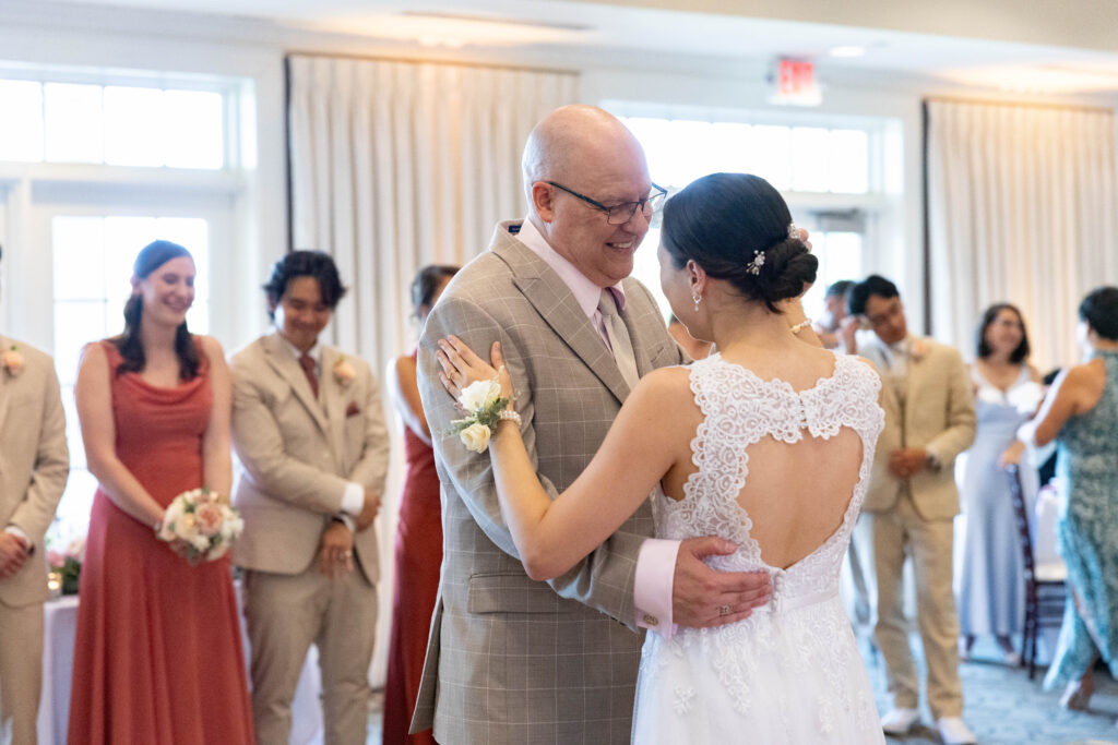 Bride and groom portrait overlooking the Potomac River at River Creek Club